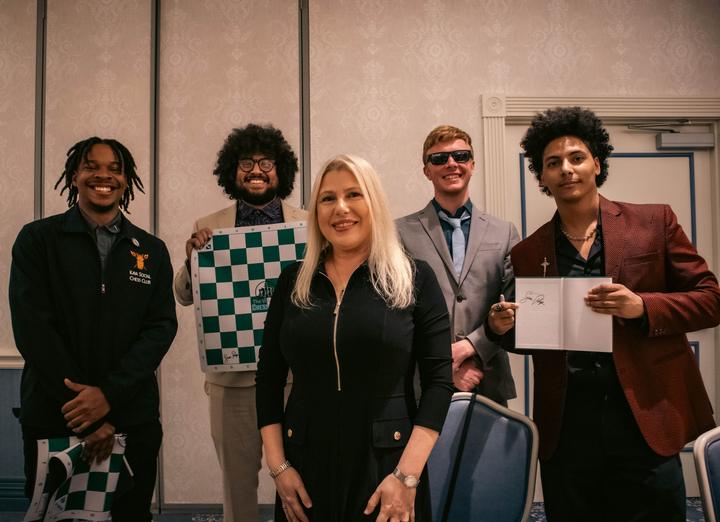 Kava Social Chess Club members at a tournament