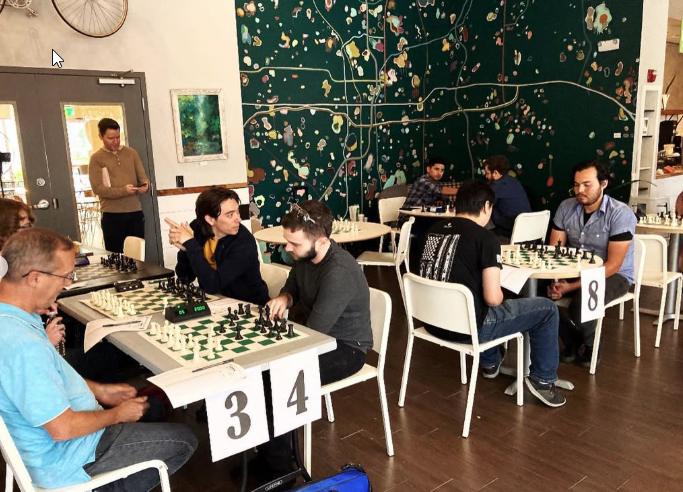 Kava Social Chess Club members at a tournament