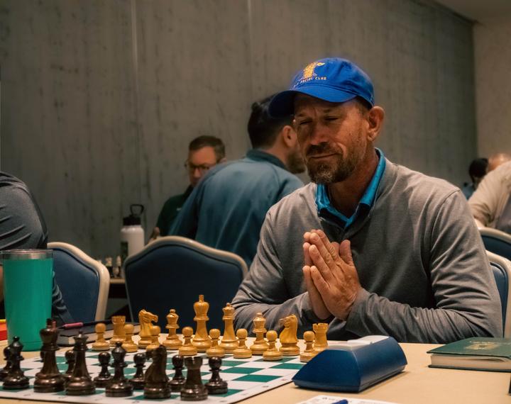 Kava Social Chess Club members at a tournament