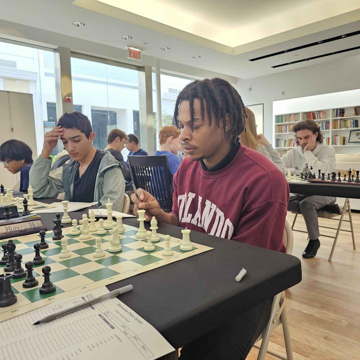 Kava Social Chess Club members at a tournament