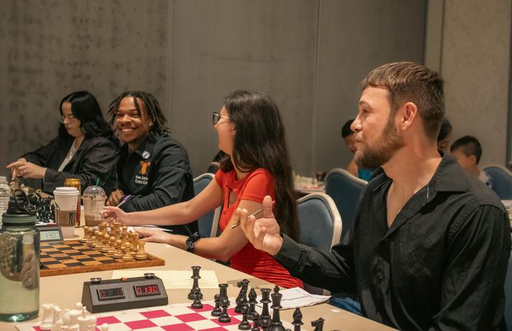 Kava Social Chess Club members at a tournament