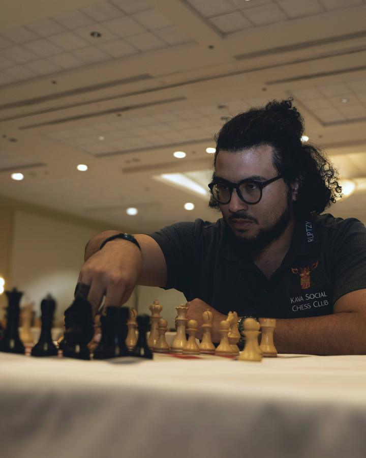 Kava Social Chess Club members at a tournament